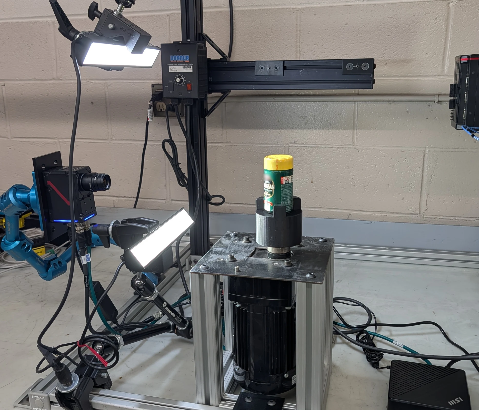 Bottle sample, inspection camera and lighting used in the dairy packaging proof of concept