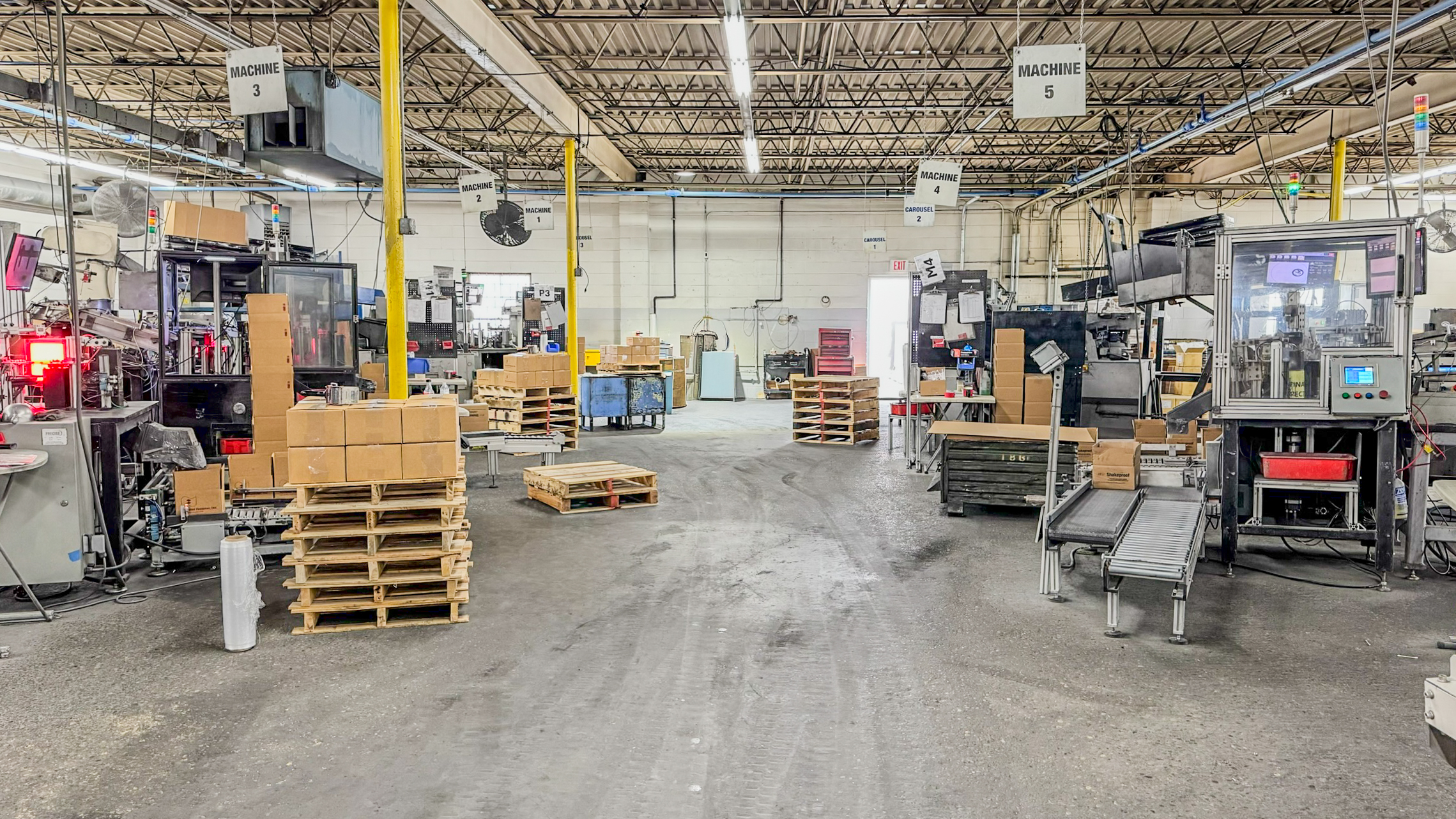 SSI sorting facility floor with organized workstations and output staging.