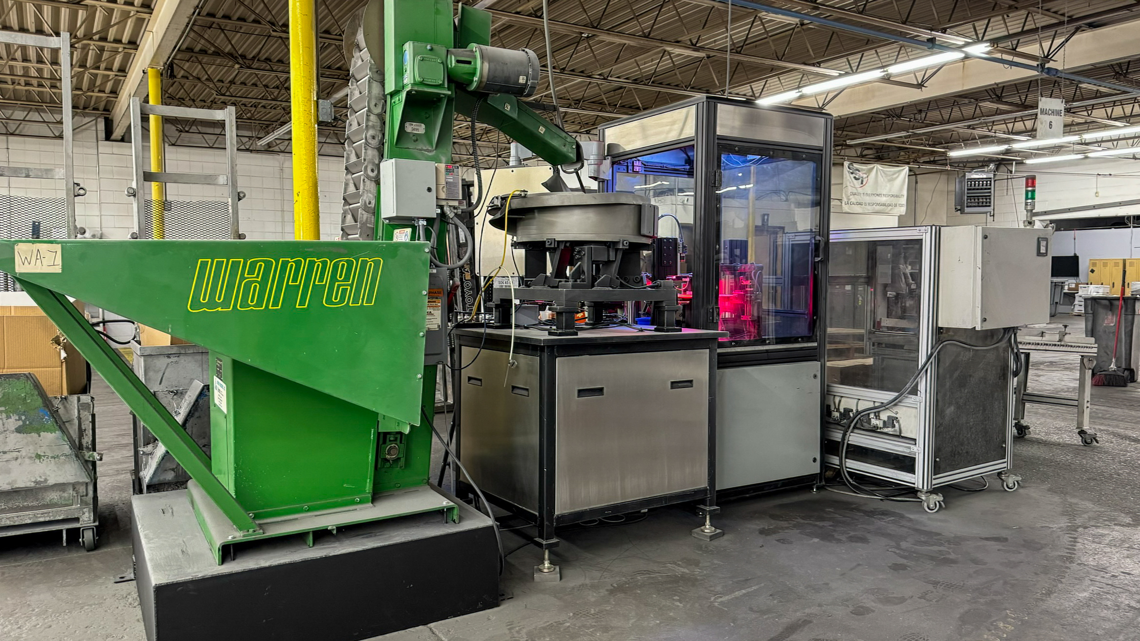 Sorting machine and organized part handling at SSI.